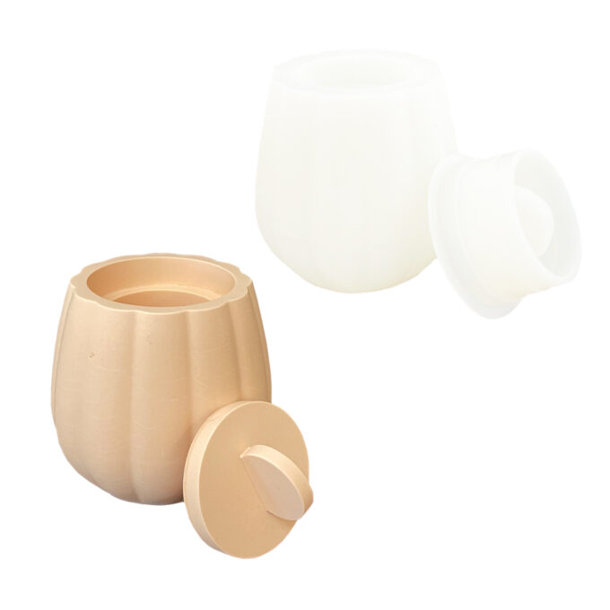 Silicone mould for casting a thick striped Jesmonite storage pot with lid